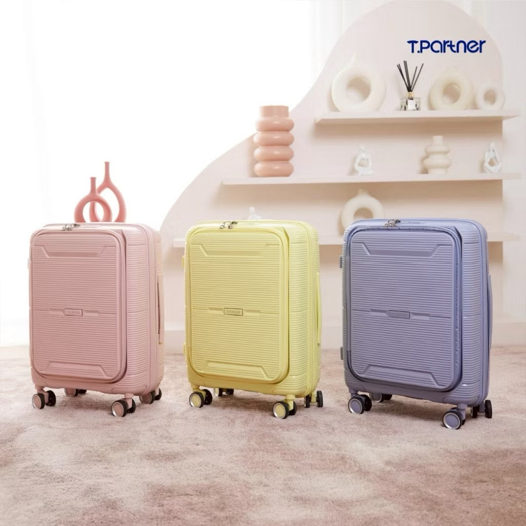 กระเป๋าเดินทางรุ่น Flip Series สีชมพู เหลือง และม่วงอ่อน วางเรียงกัน